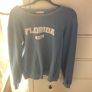 This is a medium blue top, in great condition wore only one time